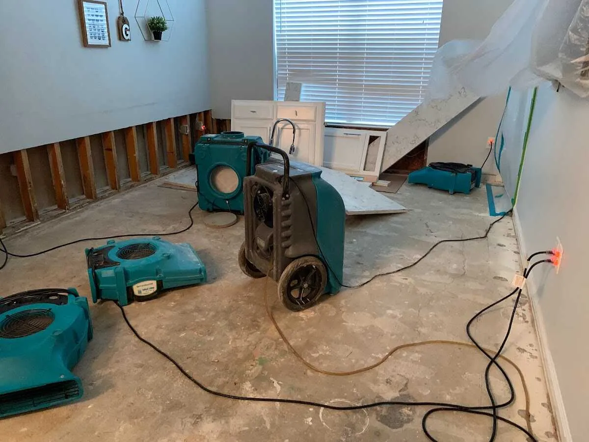 Dehumidifier in flood-cut room for Water Damage Restoration in Clemmons