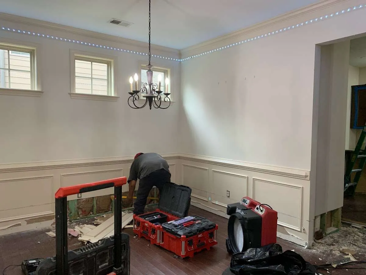 Restoration technician with professional equipment in Clemmons